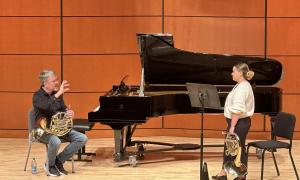 Richard Deane (left) giving instruction during his Horn Workshop master class.