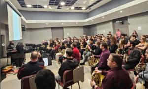 Students gathered for a master class presentation in the Choral Suite in the School of Music Building.