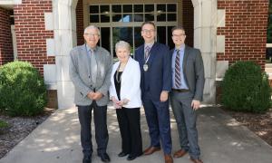 Daniel Ellis with his parents Phil and Judy Ellis (left) and partner, Shaun Baer, director of public relations for the Hugh Hodgson School of Music