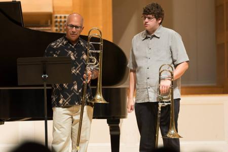 Matt Norman (right) studies at the 2015 Alessi Seminar at the University of Oregon in Eugene, Oregon.