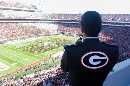 Joel Garcia performs “Battle Hymn of the Bulldog Nation” as soloist in Sanford Stadium on Nov. 19, 2016.