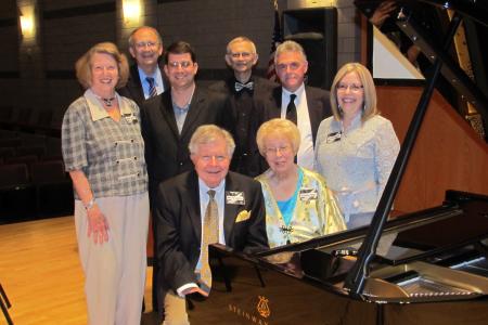 Faculty and donors by the new Steinway