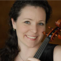 Maggie Snyder, viola in front of a brown background